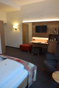 Kama o mga kama sa kuwarto sa Stadt-Gut-Hotels - Das Kleine Hotel