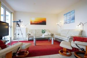 Khu vực ghế ngồi tại Haus-Ostseeapartments-am-Fehmarnsund-Wohnung-31-Beachlife