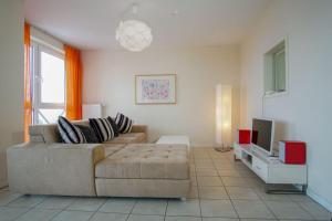 Khu vực ghế ngồi tại Haus-Ostseeapartments-am-Fehmarnsund-Wohnung-28-White-Pearl