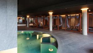 Bazén v ubytování Vilnius Grand Resort nebo v jeho okolí