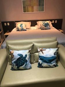 Łóżko lub łóżka w pokoju w obiekcie ALIANÇA TABATINGA Hospedagem Boutique