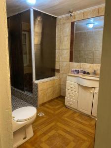 a bathroom with a toilet and a sink at Casaantivero boutique,casa de huéspedes in San Fernando +85 photos