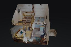 an overhead view of a kitchen and a living room at Captains Lookout (Studio apartment) in Brecon