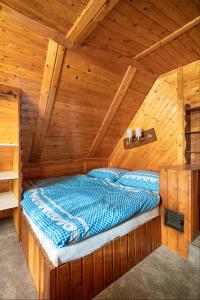 Postel nebo postele na pokoji v ubytování Chalupa Pod Lesem