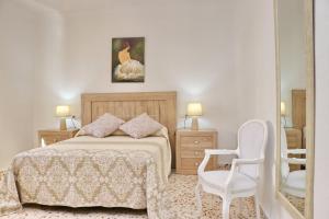 A bed or beds in a room at Apartamento Cortes