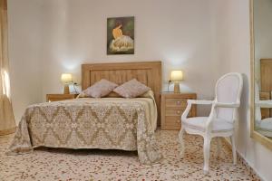 A bed or beds in a room at Apartamento Cortes