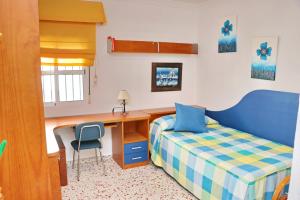A seating area at Apartamento Cortes