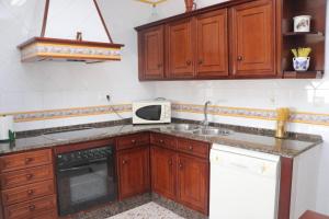 A kitchen or kitchenette at Apartamento Cortes