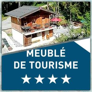 a sign that says neville de tourette with a house at Calme et sérénité 4 étoiles pour vos séjours VSD ou + in Sixt