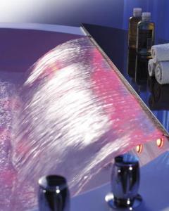 a stream of water on top of a sink at Platani Hotel in Bolsena