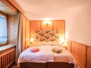 Posteľ alebo postele v izbe v ubytovaní Chalet Osmar Appartamento 1