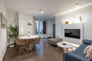 A seating area at tuGuest S.Pedro Apartments