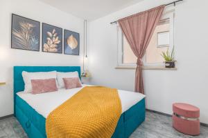 Кровать или кровати в номере Apartman Nina