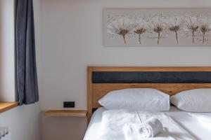 Posteľ alebo postele v izbe v ubytovaní Apartment LISAL by All in One Apartments
