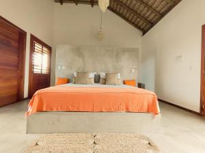 Ένα ή περισσότερα κρεβάτια σε δωμάτιο στο Casa dos Irmãos