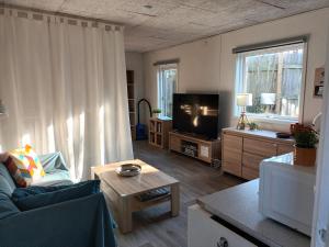 TV a/nebo společenská místnost v ubytování Bonjour Copenhagen