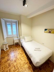 Cama o camas de una habitación en PR Iacobus Suites