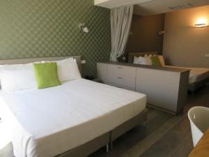 Postel nebo postele na pokoji v ubytování Hotel Joseph