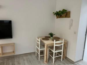 Televízia a/alebo spoločenská miestnosť v ubytovaní Alzira bonita Apartamento D junto a Plaza Mayor, Santa Catalina