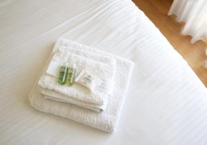 A bed or beds in a room at Penthouse -Breathtaking sea view-Just on the beach