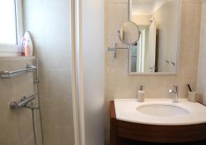 A bathroom at Penthouse -Breathtaking sea view-Just on the beach