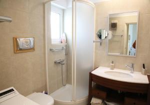 A bathroom at Penthouse -Breathtaking sea view-Just on the beach Még 29 kép