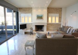 A seating area at Penthouse -Breathtaking sea view-Just on the beach