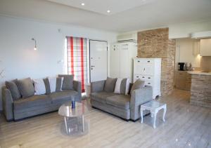A kitchen or kitchenette at Penthouse -Breathtaking sea view-Just on the beach