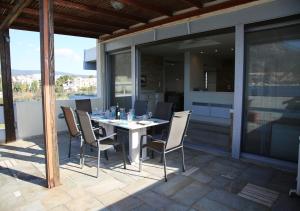 A balcony or terrace at Penthouse -Breathtaking sea view-Just on the beach