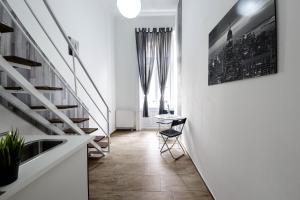 Televízia a/alebo spoločenská miestnosť v ubytovaní Rio's Stylish Central Flats