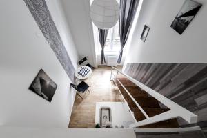 Televízia a/alebo spoločenská miestnosť v ubytovaní Rio's Stylish Central Flats