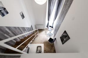 Televízia a/alebo spoločenská miestnosť v ubytovaní Rio's Stylish Central Flats