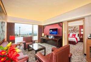 Televiisor ja/või meelelahutuskeskus majutusasutuses Hotel Riviera Macau