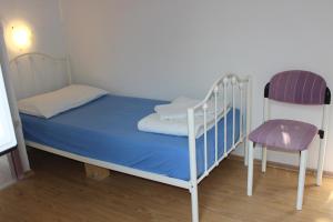 Postel nebo postele na pokoji v ubytování Apartments Blue Sea