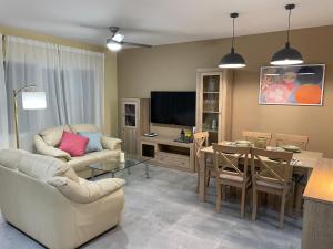 Televízia a/alebo spoločenská miestnosť v ubytovaní CERES Home