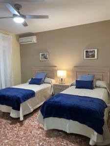 Posteľ alebo postele v izbe v ubytovaní CERES Home