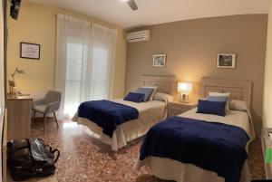 Posteľ alebo postele v izbe v ubytovaní CERES Home