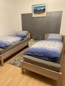 מיטה או מיטות בחדר ב-Apartment 22
