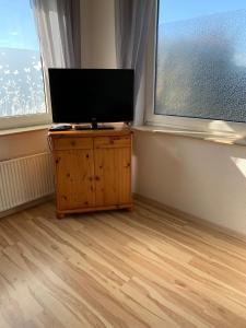 TV a/nebo společenská místnost v ubytování Apartment 22