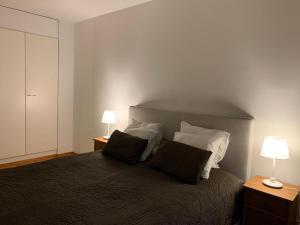 Postel nebo postele na pokoji v ubytování Sea, Sauna and City Center