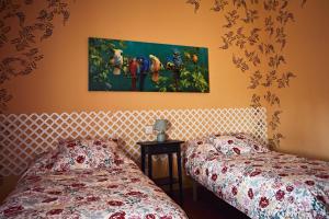 A bed or beds in a room at CASA ALTO LOS RENEDOS