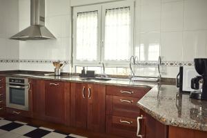 A kitchen or kitchenette at CASA ALTO LOS RENEDOS
