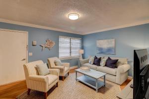 a living room with a couch and chairs and a tv at #61 Beautiful Condo Ideal Location 2BDR/2 Parkings in Hilton Head Island