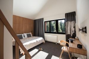 Posteľ alebo postele v izbe v ubytovaní Villa Drosera s wellnessom, Račkova dolina v Západných Tatrách