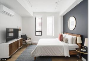 Ένα ή περισσότερα κρεβάτια σε δωμάτιο στο Bakan- Quartier des Congres, Convention District