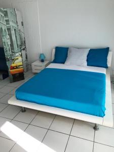 En eller flere senge i et værelse på Cozy studio with lake view - 40 m² - Saint Martin