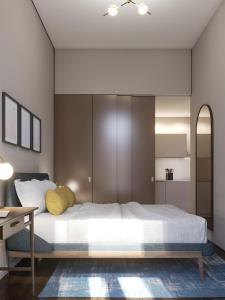Ein Bett oder Betten in einem Zimmer der Unterkunft Gallery Townhouse & Home