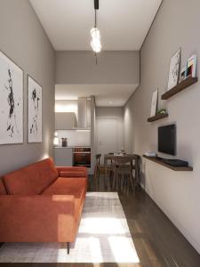 TV/Unterhaltungsangebot in der Unterkunft Gallery Townhouse & Home