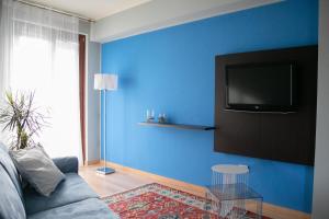 TV tai viihdekeskus majoituspaikassa Castello Lovere appartamenti