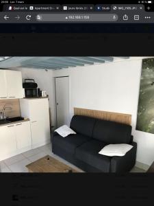 Kuchyň nebo kuchyňský kout v ubytování Studio coeur de Luc/Mer